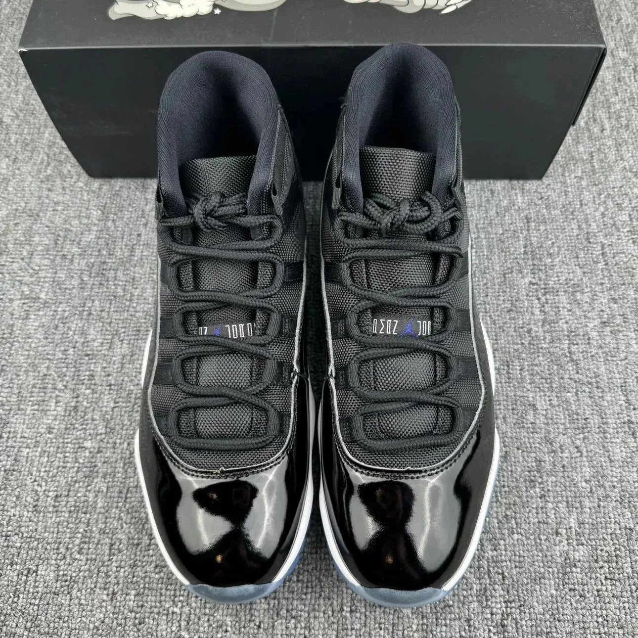Air Jordan 11 White Cement Grey Elephant Print High Top Sneakers