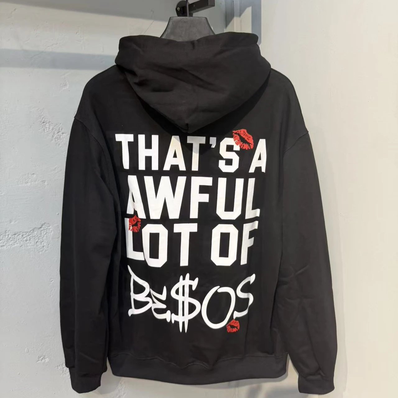 Black Graphic Hoodie With Red Lip Print And Text Statement