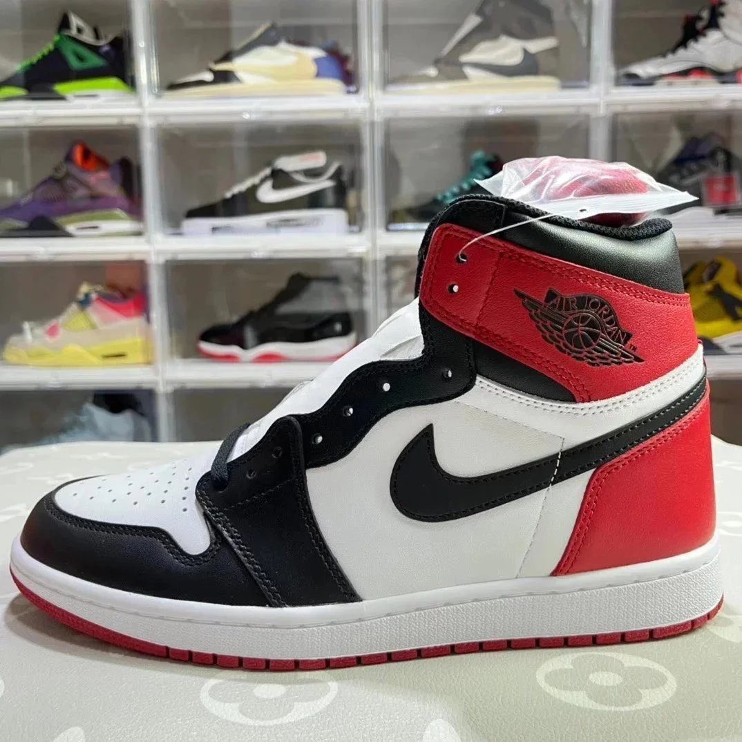 Nike Air Jordan 1 University Blue Black White High Top Sneakers