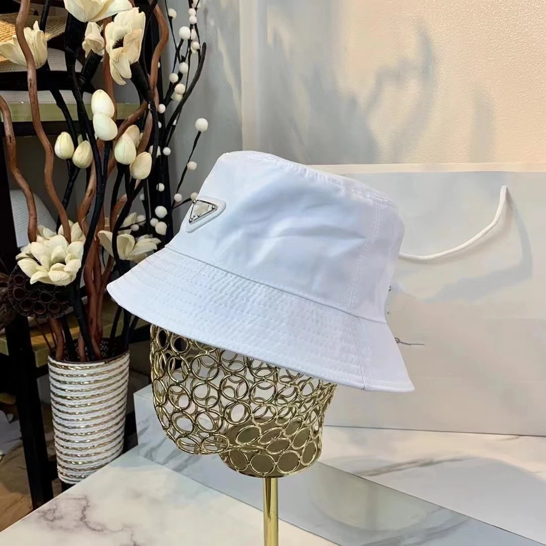 Prada Hats Nylon bucket hat with triangle logo plaque image 3