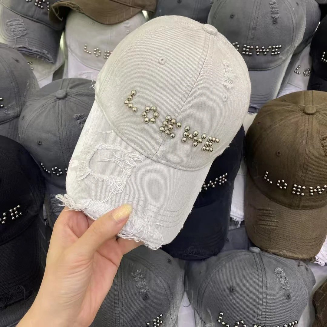 Unbranded Hats Distressed studded LOVE baseball cap — Off-white