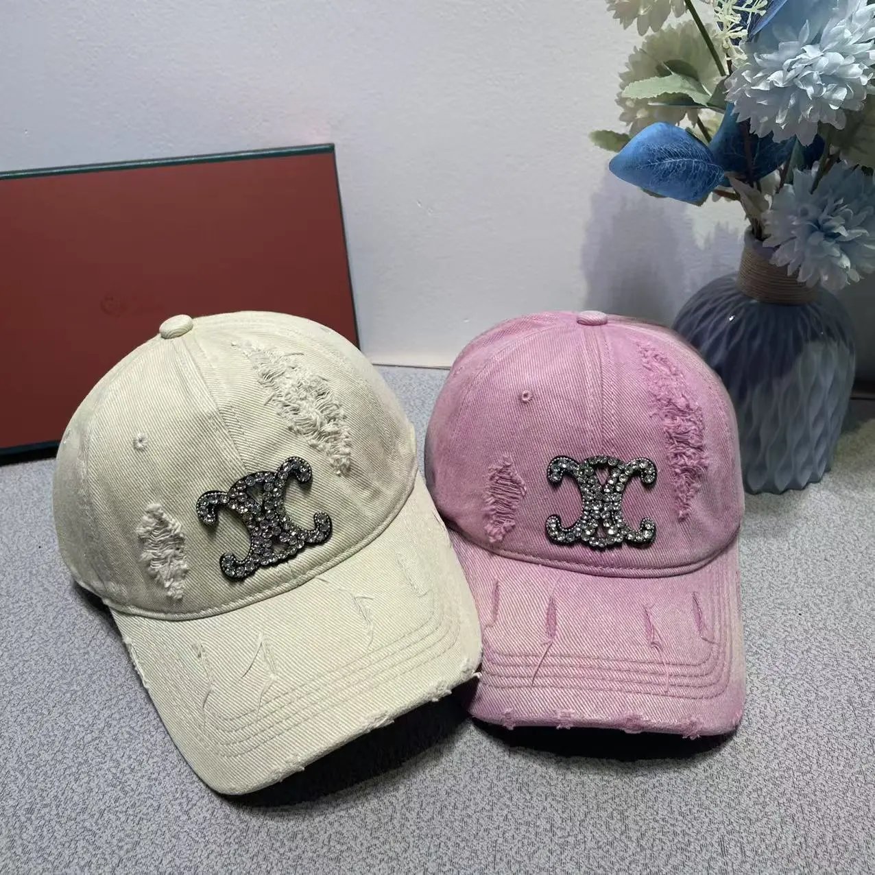 Chanel Logo Embellished Distressed Cotton Baseball Cap