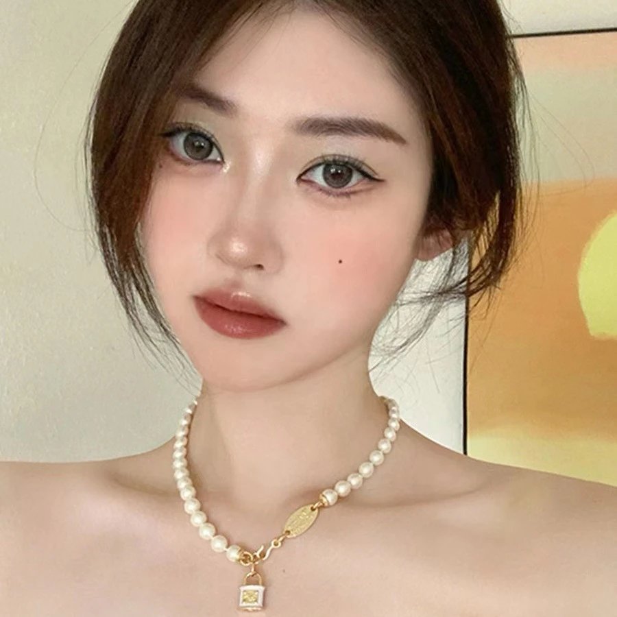 Vivienne Westwood Pearl White Lock Charm Necklace