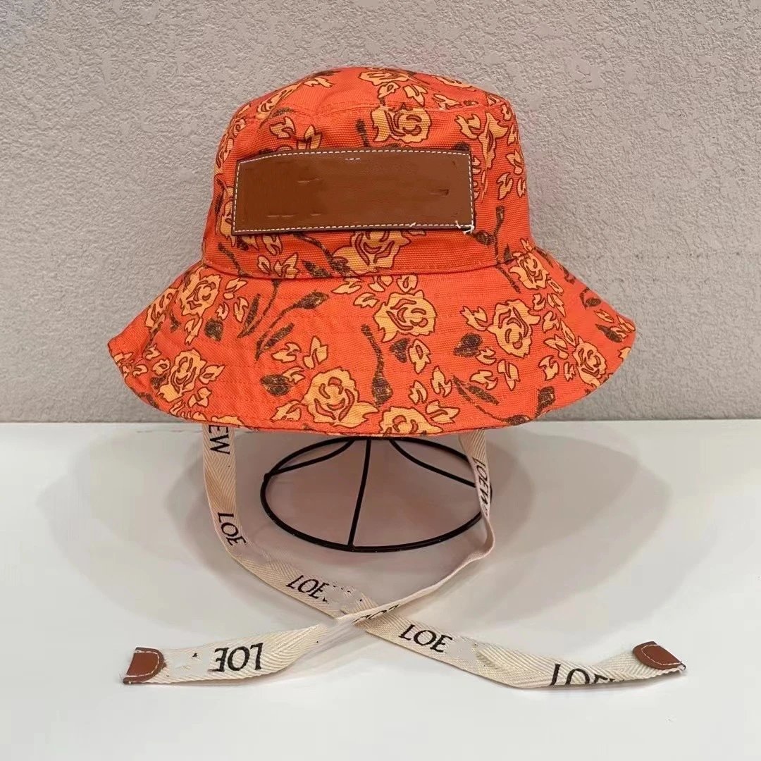 Unbranded Hats Printed wide-brim bucket hat with chin strap — Tangerine red
