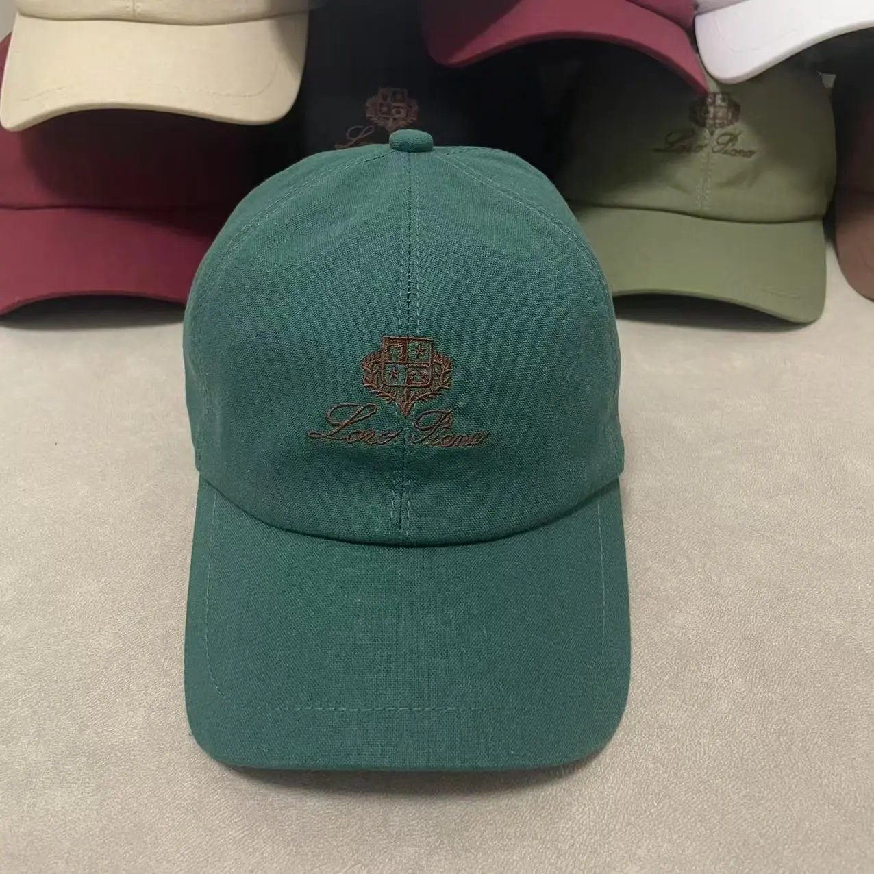 Loro Piana Hats Embroidered Crest Baseball Cap — Emerald green