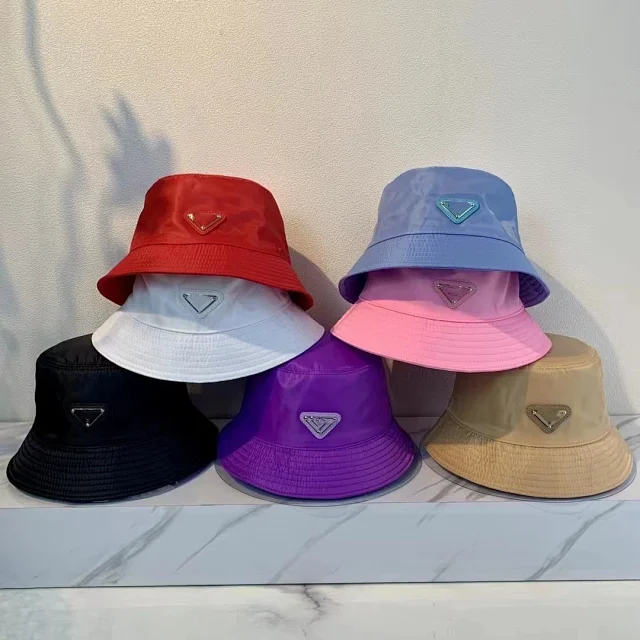 Prada Hats Nylon bucket hat with triangle logo plaque product detail image 1