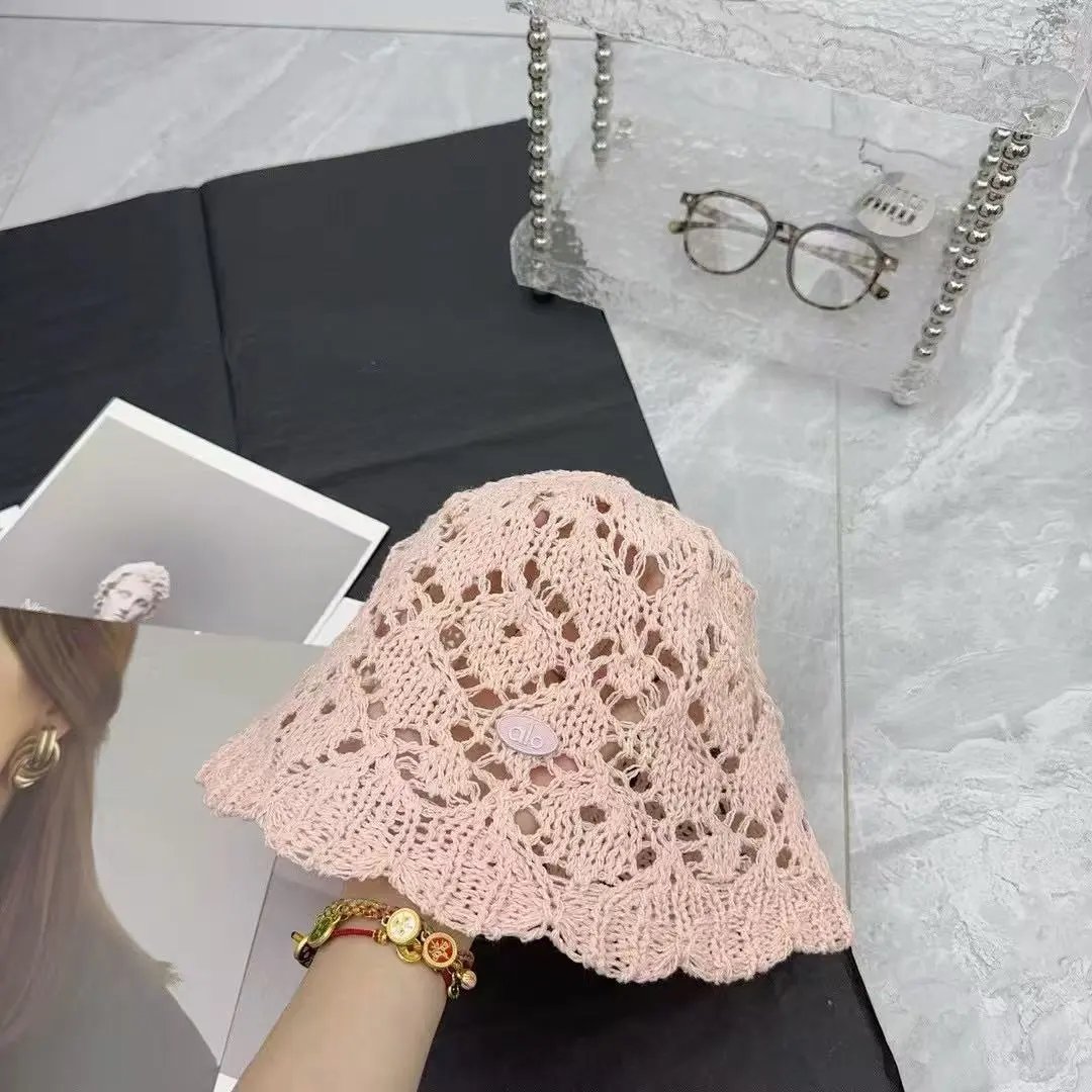 alo Hats Crochet openwork bucket hat with scalloped brim — Pink