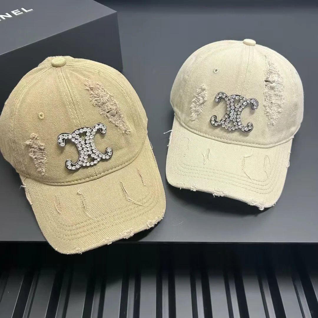 Chanel Logo Embellished Distressed Cotton Baseball Cap