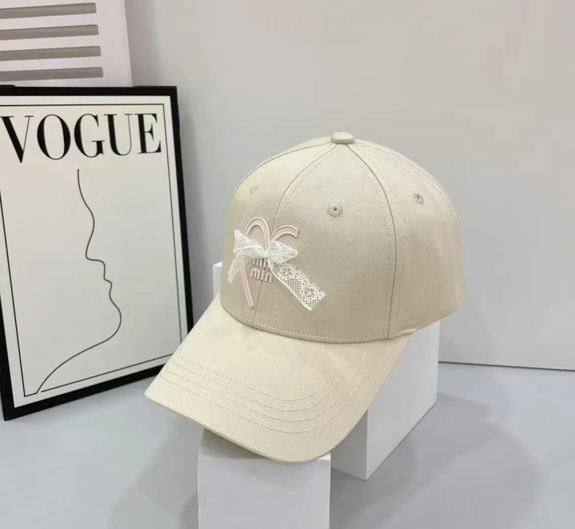 Miu Hats Heart and Lace Bow Baseball Cap — Off-white