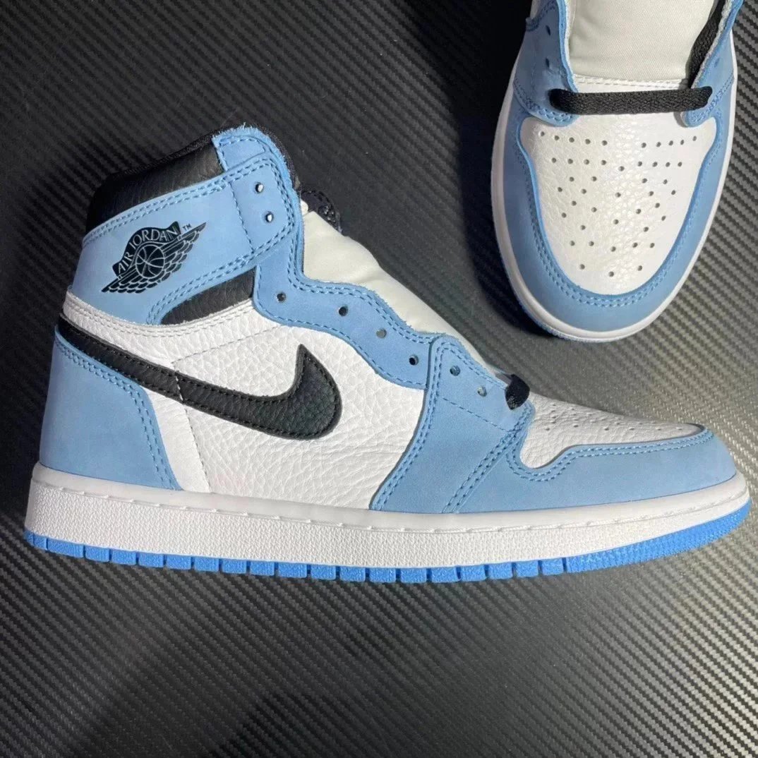 Nike Air Jordan 1 University Blue Black White High Top Sneakers