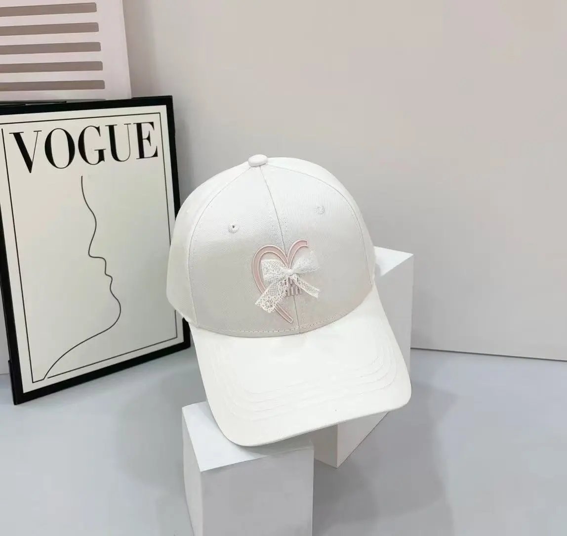 Miu Hats Heart and Lace Bow Baseball Cap — white