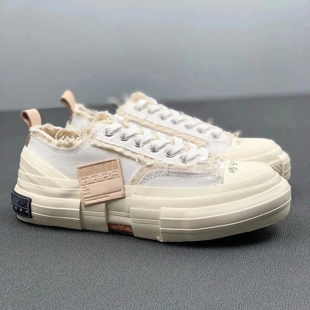 XVESSEL Sneakers frayed canvas low-top with patchwork sole — Off-white