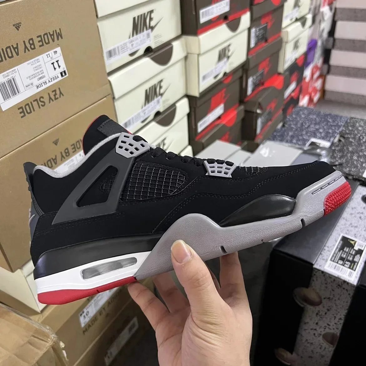 Nike Air Jordan 4 White Black Cement Retro Sneakers
