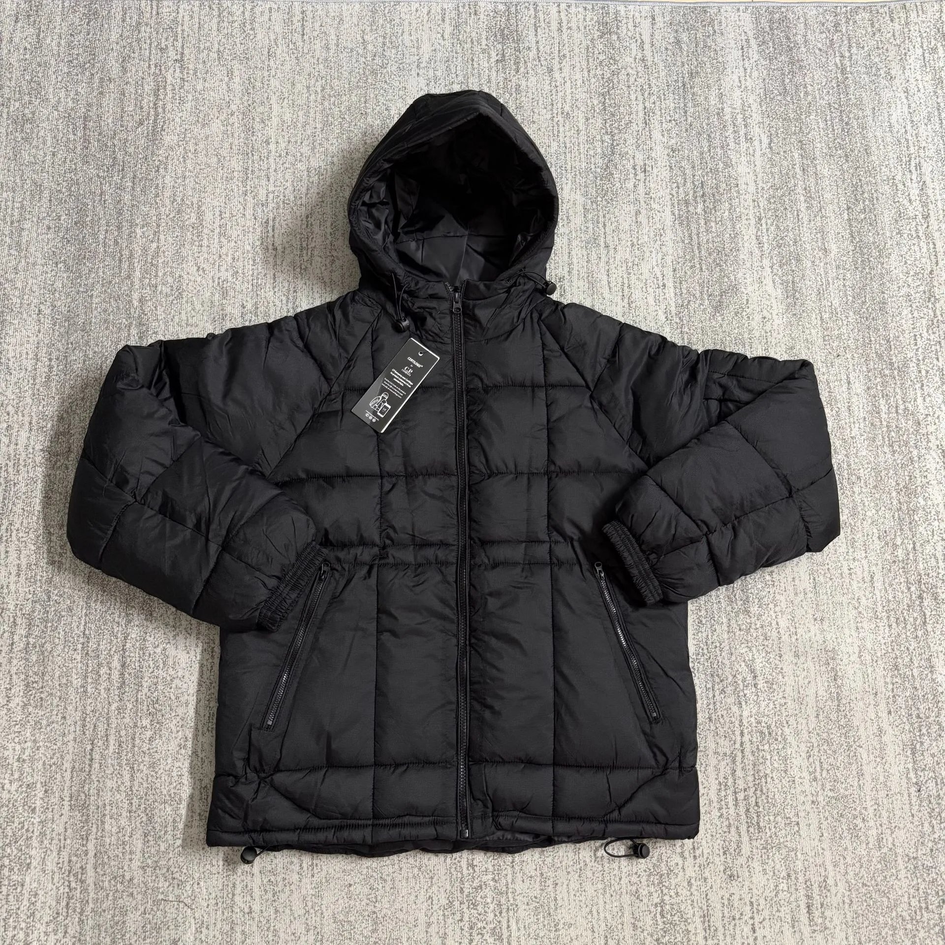 C.P. Company Jackets Hooded quilted puffer jacket with lens sleeve detail — Black