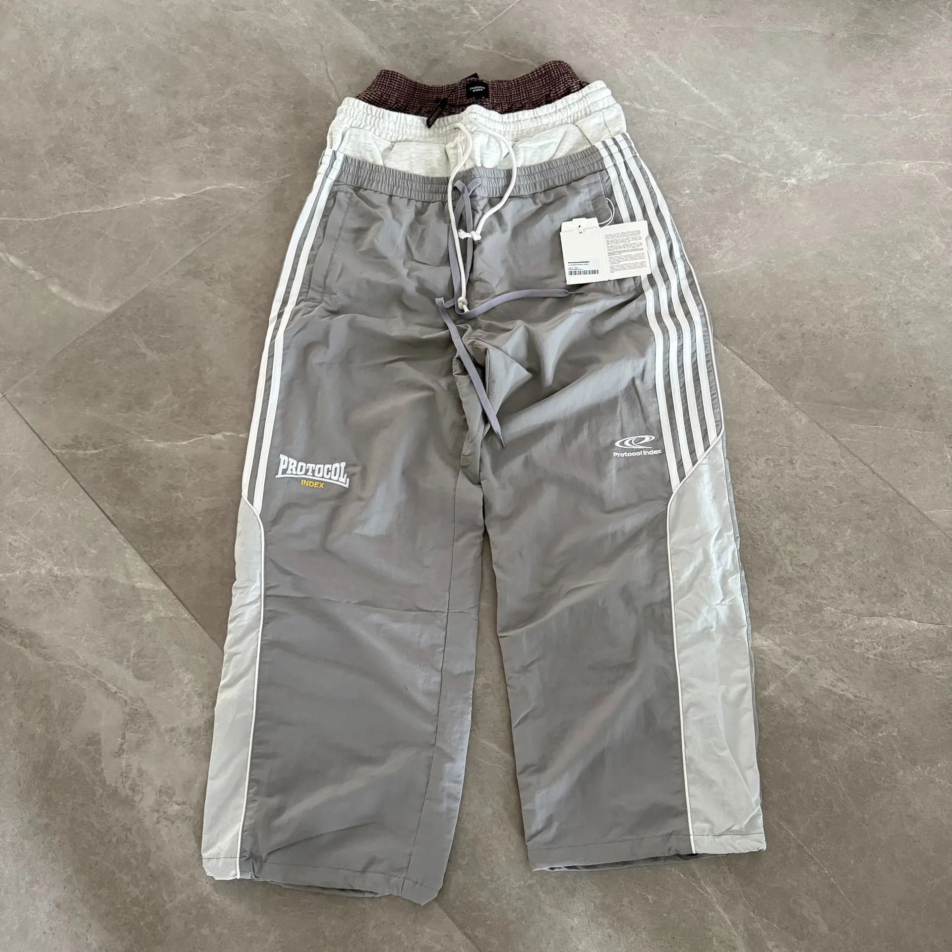 Black Track Pants with White Side Stripes and Burgundy Waistband