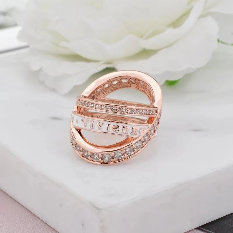 Gold Tone Cross Over White Enamel Crystal Ring