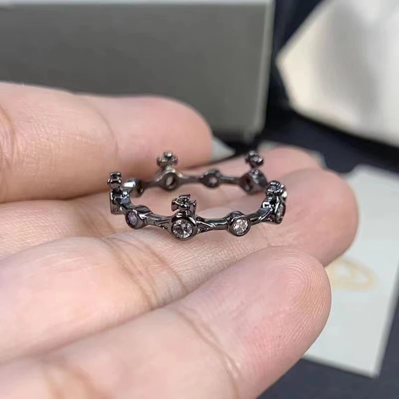 Black Rhodium Crown Design Ring With Clear And Purple Cubic Zirconia