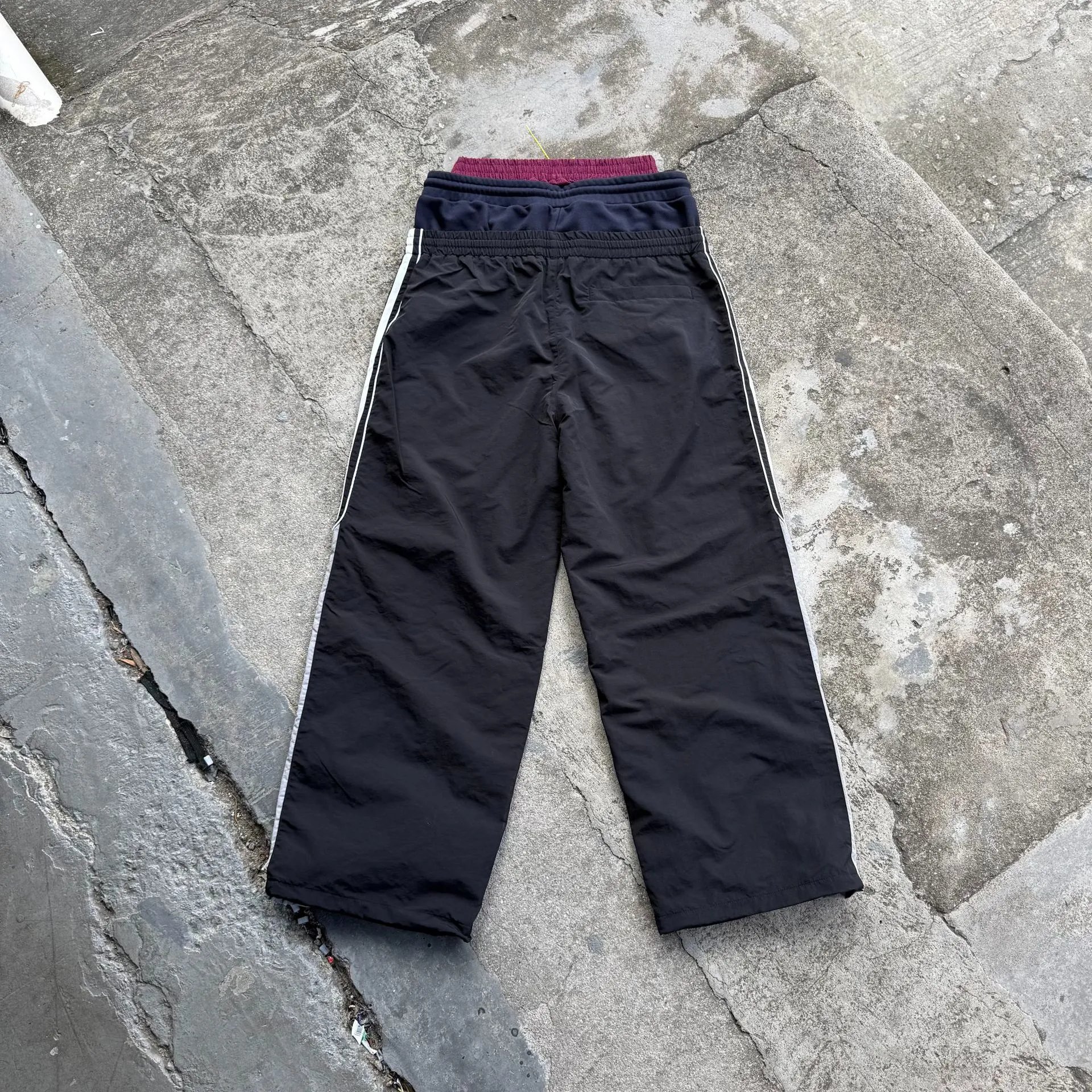 Black Track Pants with White Side Stripes and Burgundy Waistband