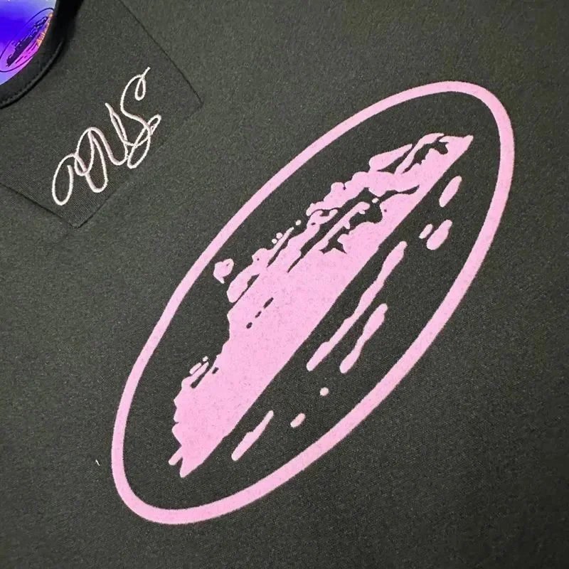 Black Performance Polo Shirt with Pink Graphic Logo and White Trim