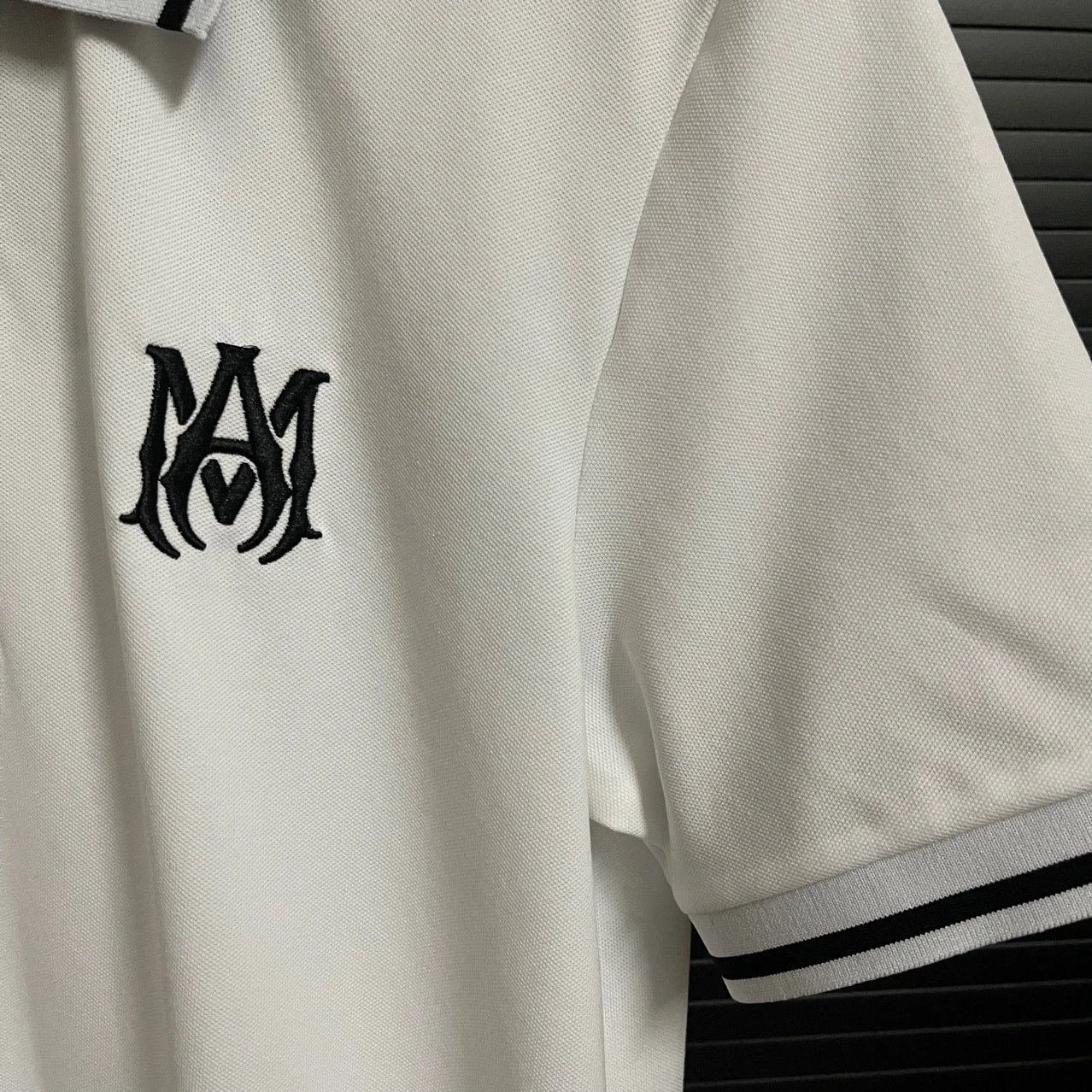 Black Polo Shirt with White Trim and Embroidered Logo Casual