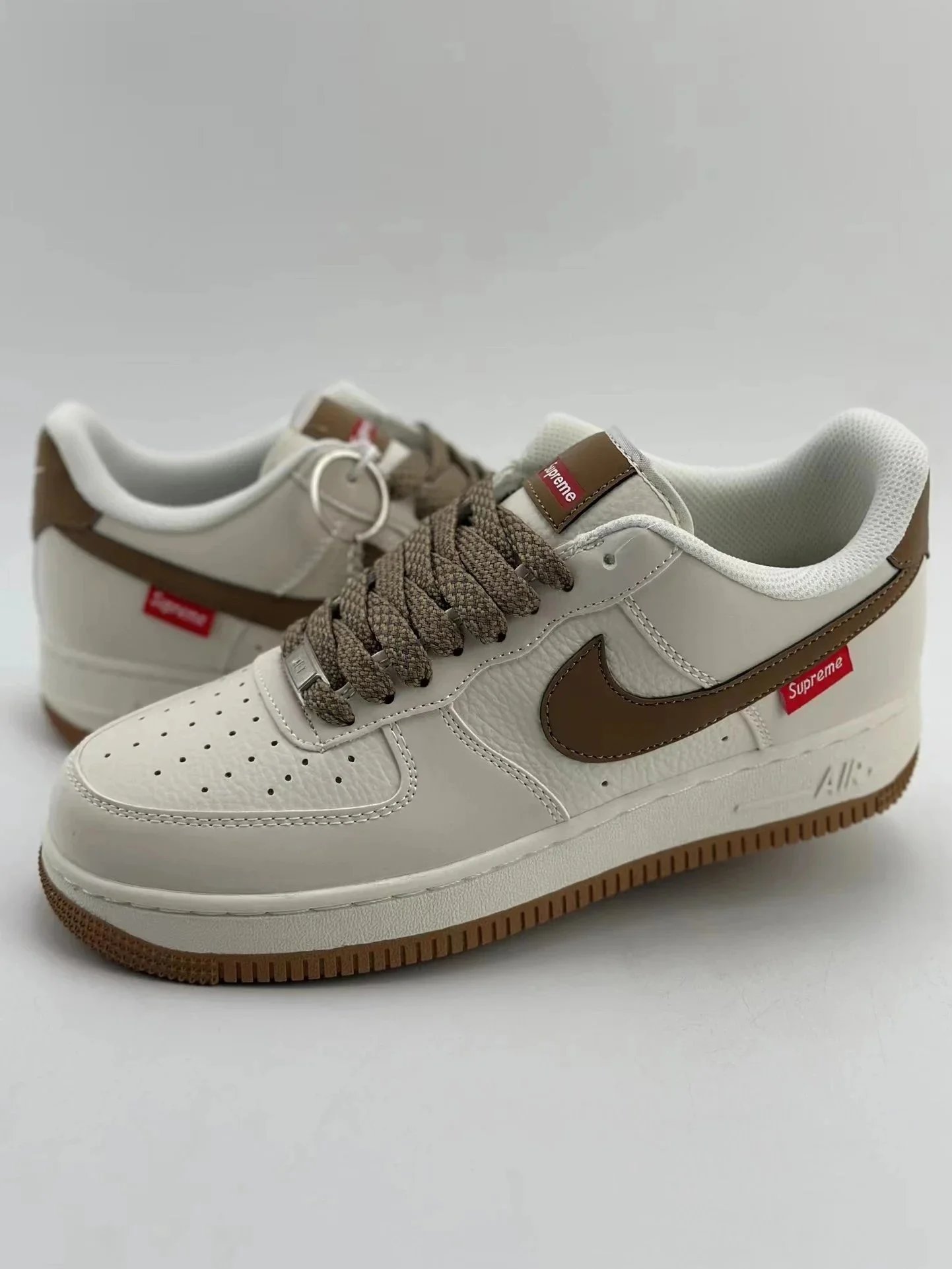 Supreme Nike Air Force 1 White Low Top Sneakers