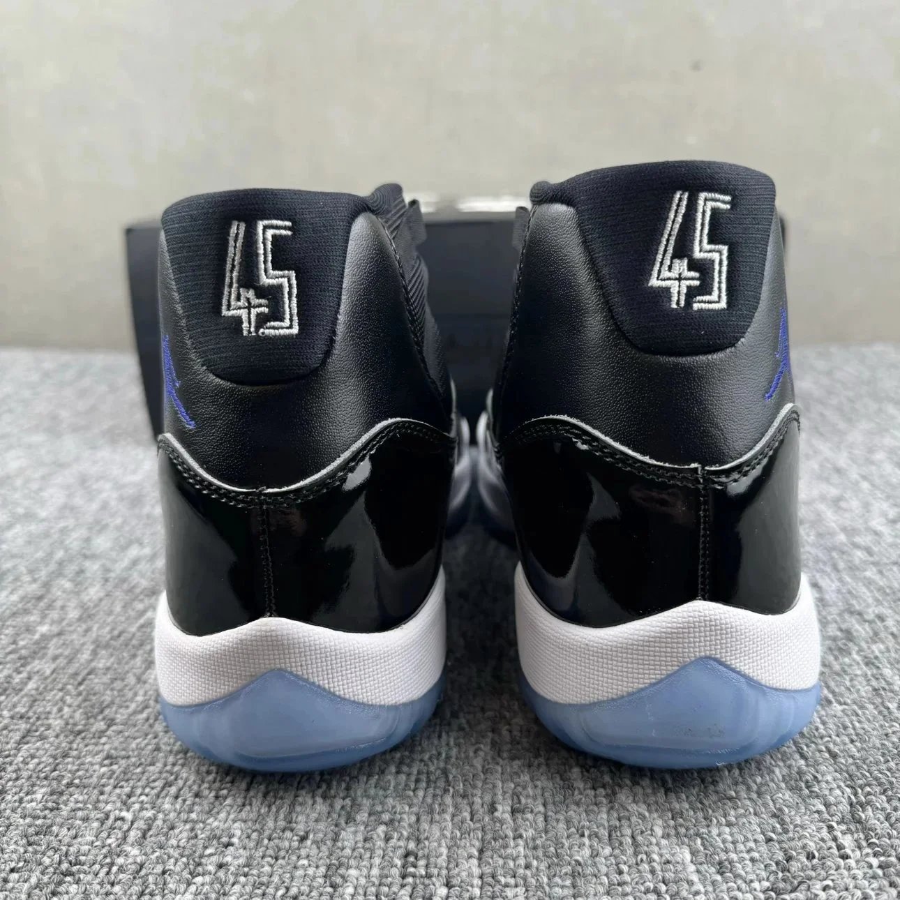 Air Jordan 11 White Cement Grey Elephant Print High Top Sneakers