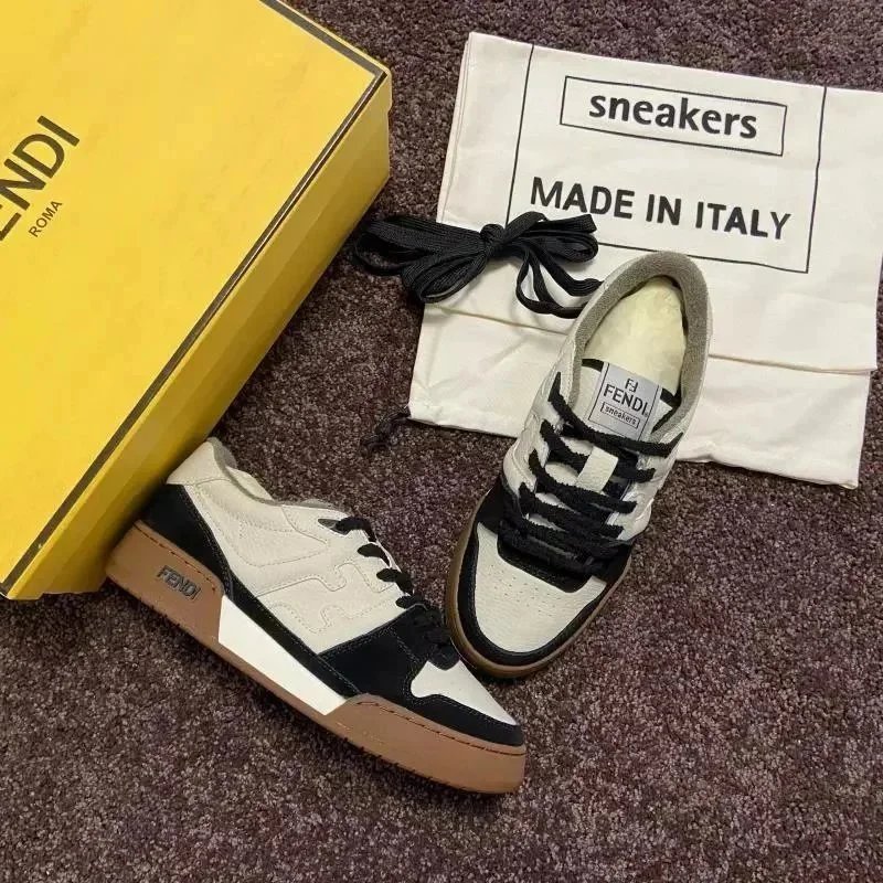Fendi Sneakers Low-top lace-up leather and suede — Black