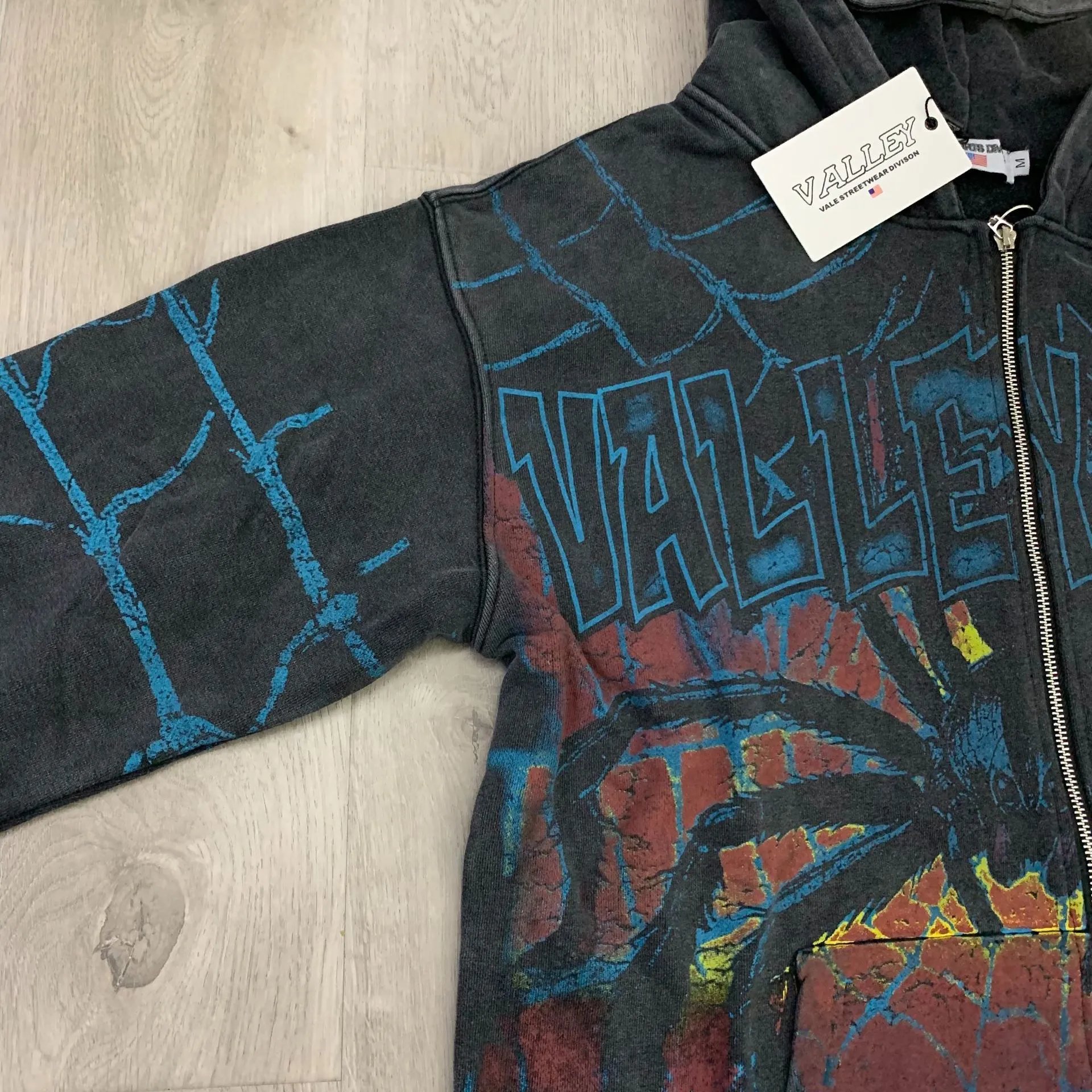 Black Hooded Zip-Up Sweatshirt With Blue Barbed Wire Print