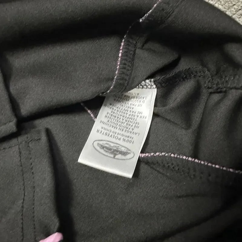 Black Performance Polo Shirt with Pink Graphic Logo and White Trim