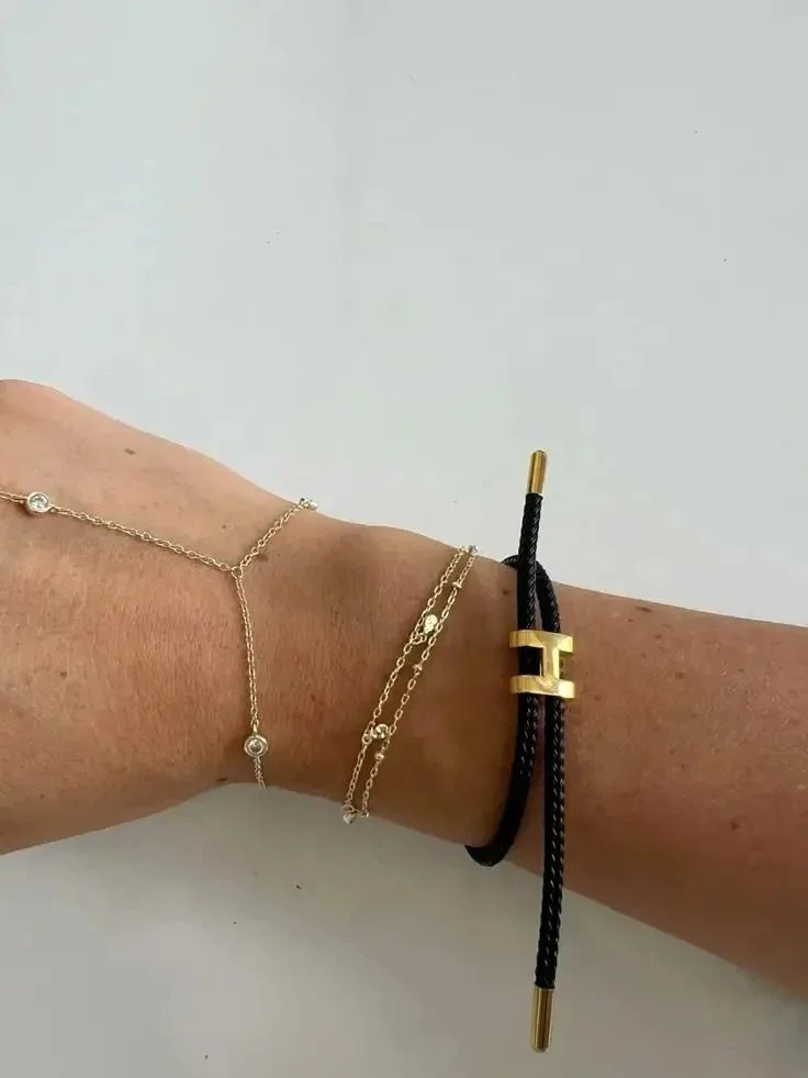 Hermès Kellychain Orange Braided Leather Bracelet