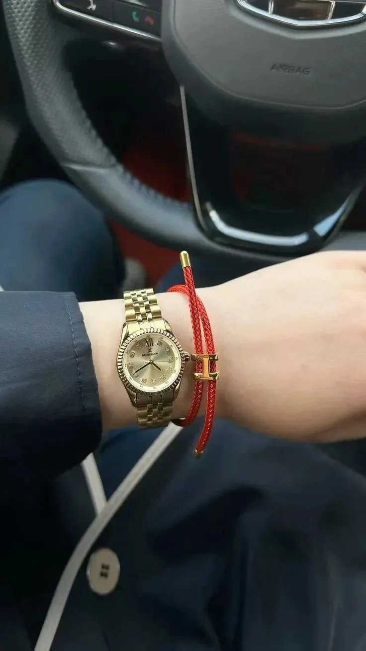 Hermès Kellychain Orange Braided Leather Bracelet