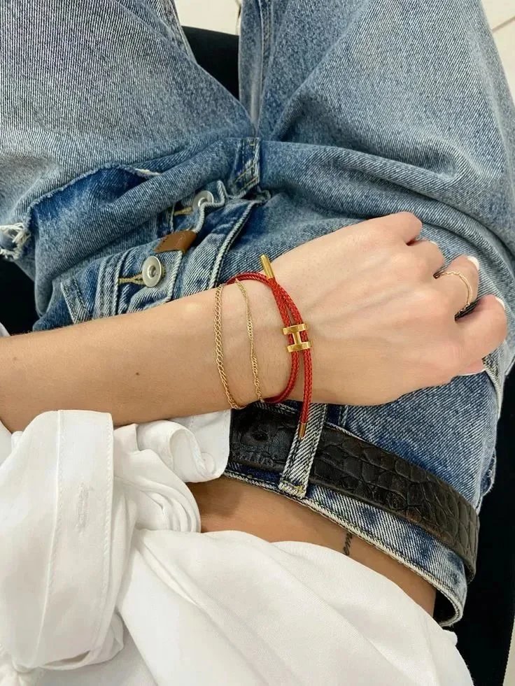 Hermès Kellychain Orange Braided Leather Bracelet