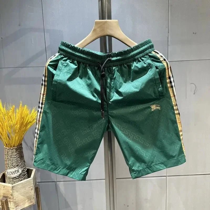 Burberry Logo-Embroidered Green Nylon Shorts with Check Stripe