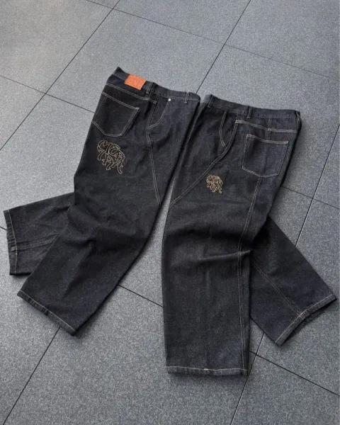 A Bathing Ape x Unknown Collaborator Denim Jeans with Embroidered Ape Head Logo - 1
