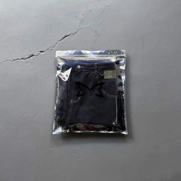 A Bathing Ape x Unknown Collaborator Denim Jeans with Embroidered Ape Head Logo - 11