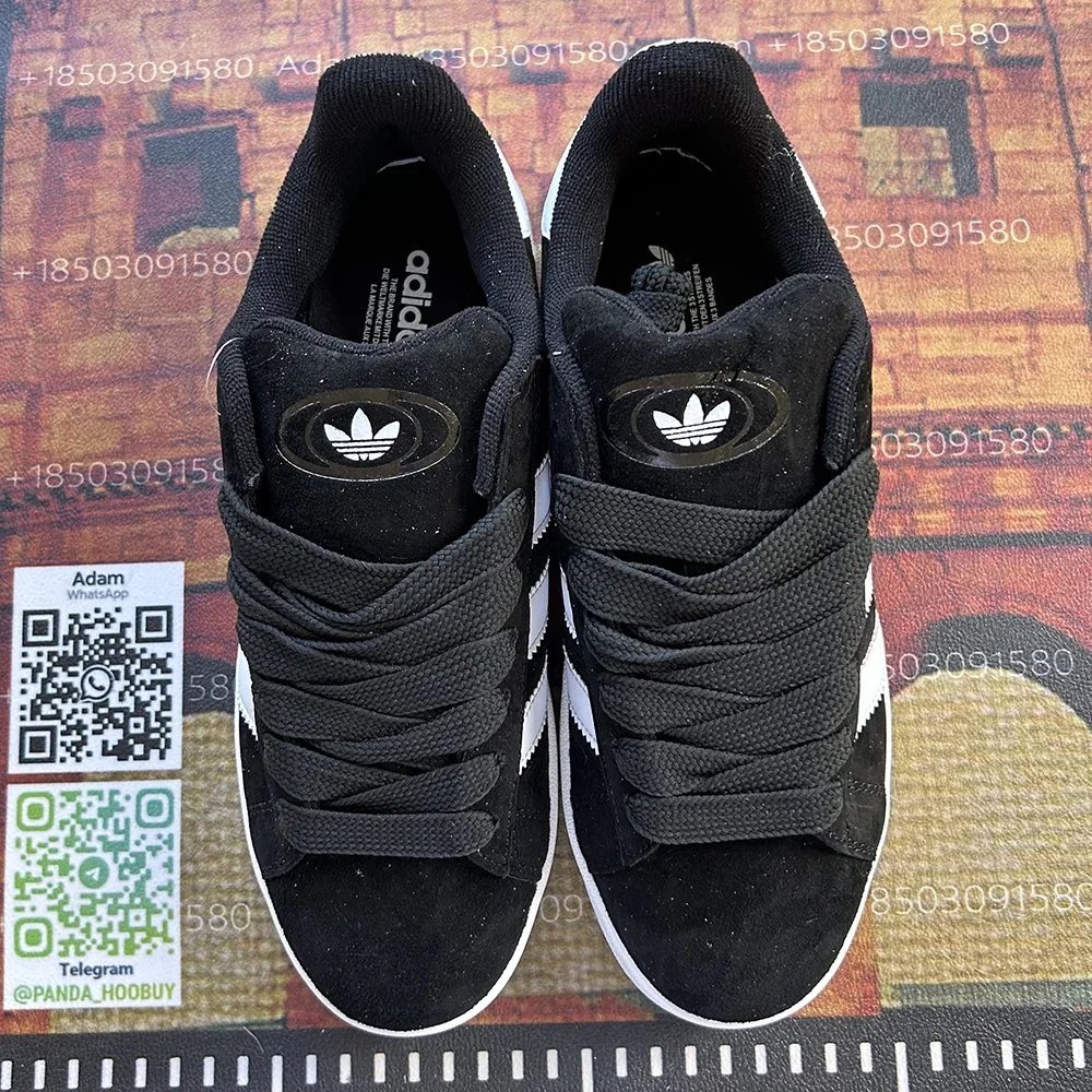 Adidas black and white low-top sneakers