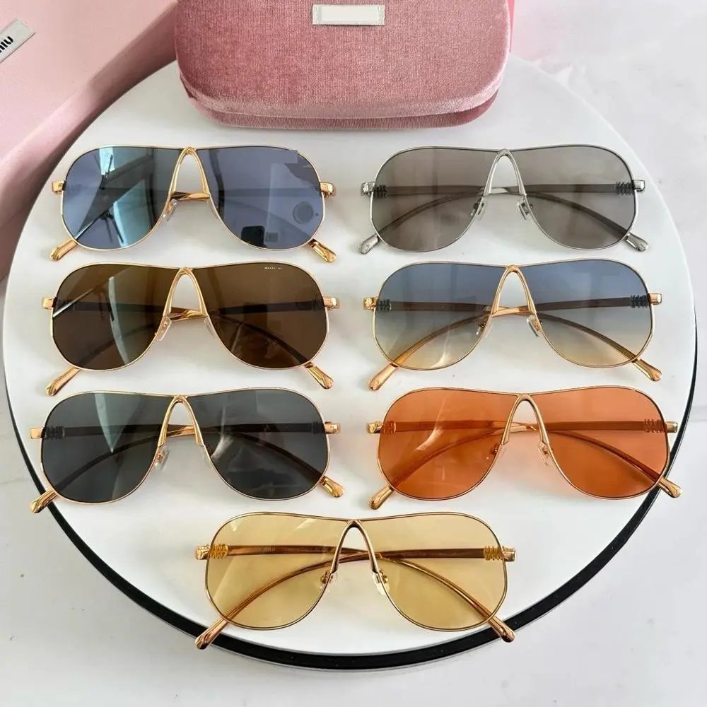 Miu Miu Rimless Sunglasses