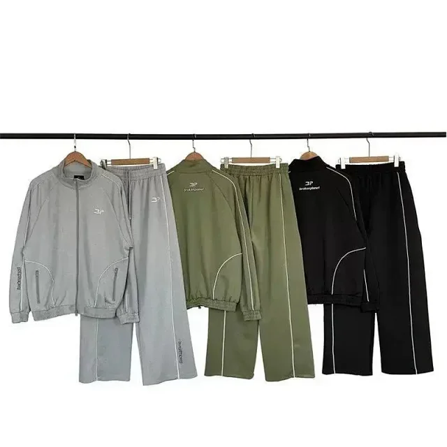 Broken Planet Market Tracksuits Zip-up track jacket and wide-leg trousers with contrast piping product detail image 1