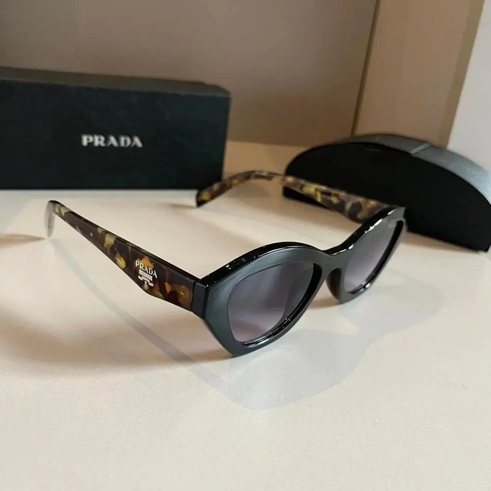 Prada Eyewear Assorted sunglasses and optical frames — Style 28