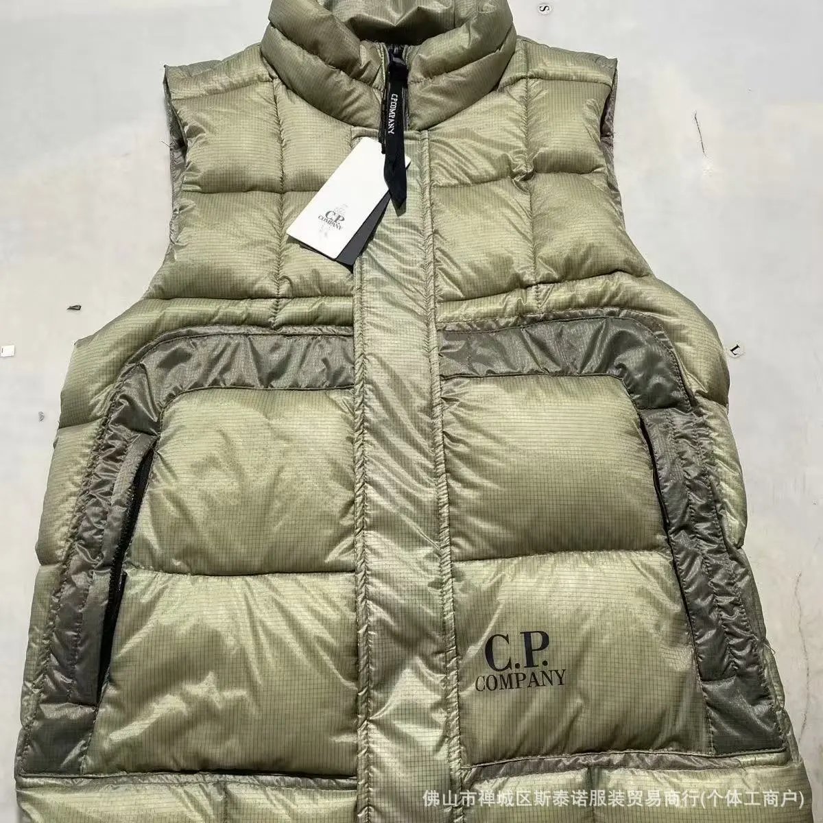 Light green down vest