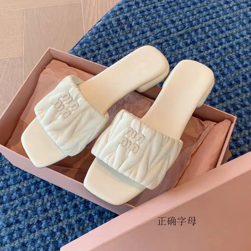 Miu Miu Quilted Leather Square Toe Slide Sandals with Gold Logo