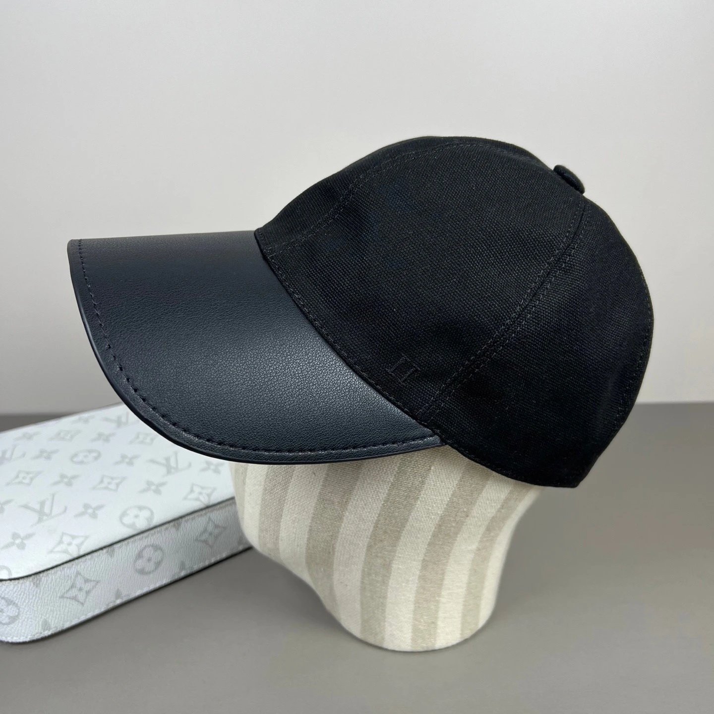 Unstructured Mesh Baseball Cap with Curved Leather Visor and Buckle Closure