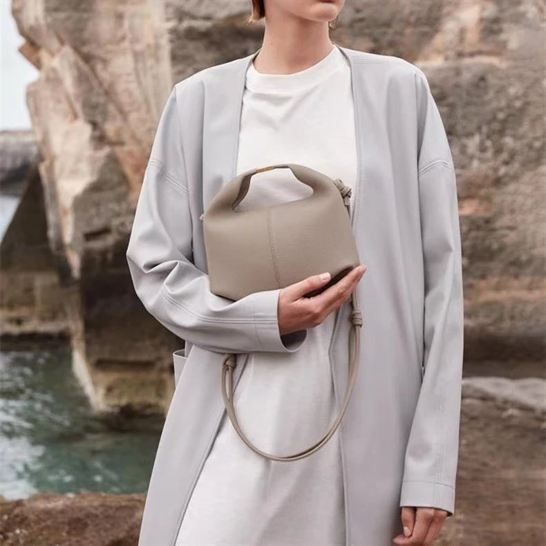 Pebbled Leather Top Handle Bag with Gold Hardware and Side Knots
