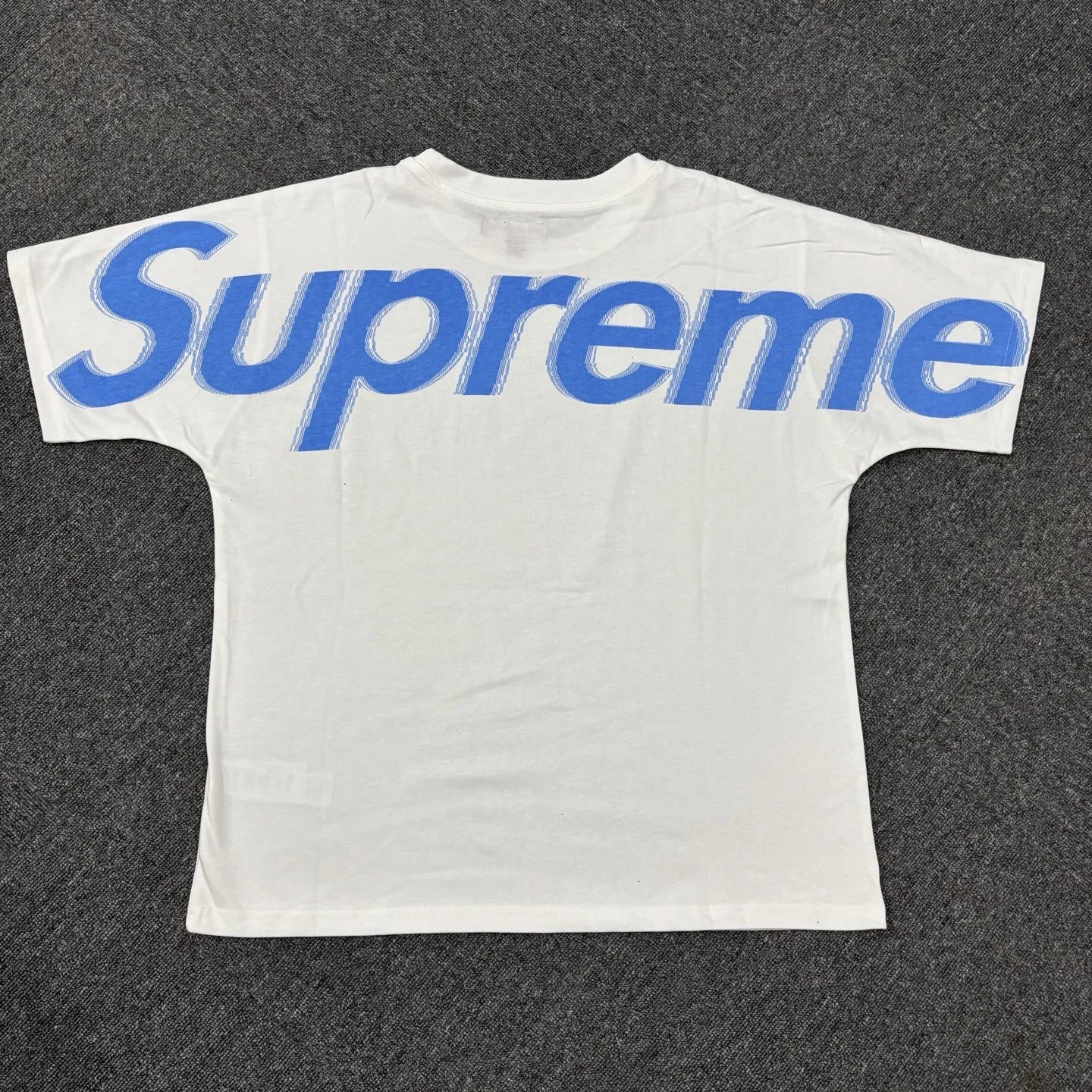 Supreme T-Shirts Logo Print Short-Sleeve T-Shirt — Blue logo on a white background