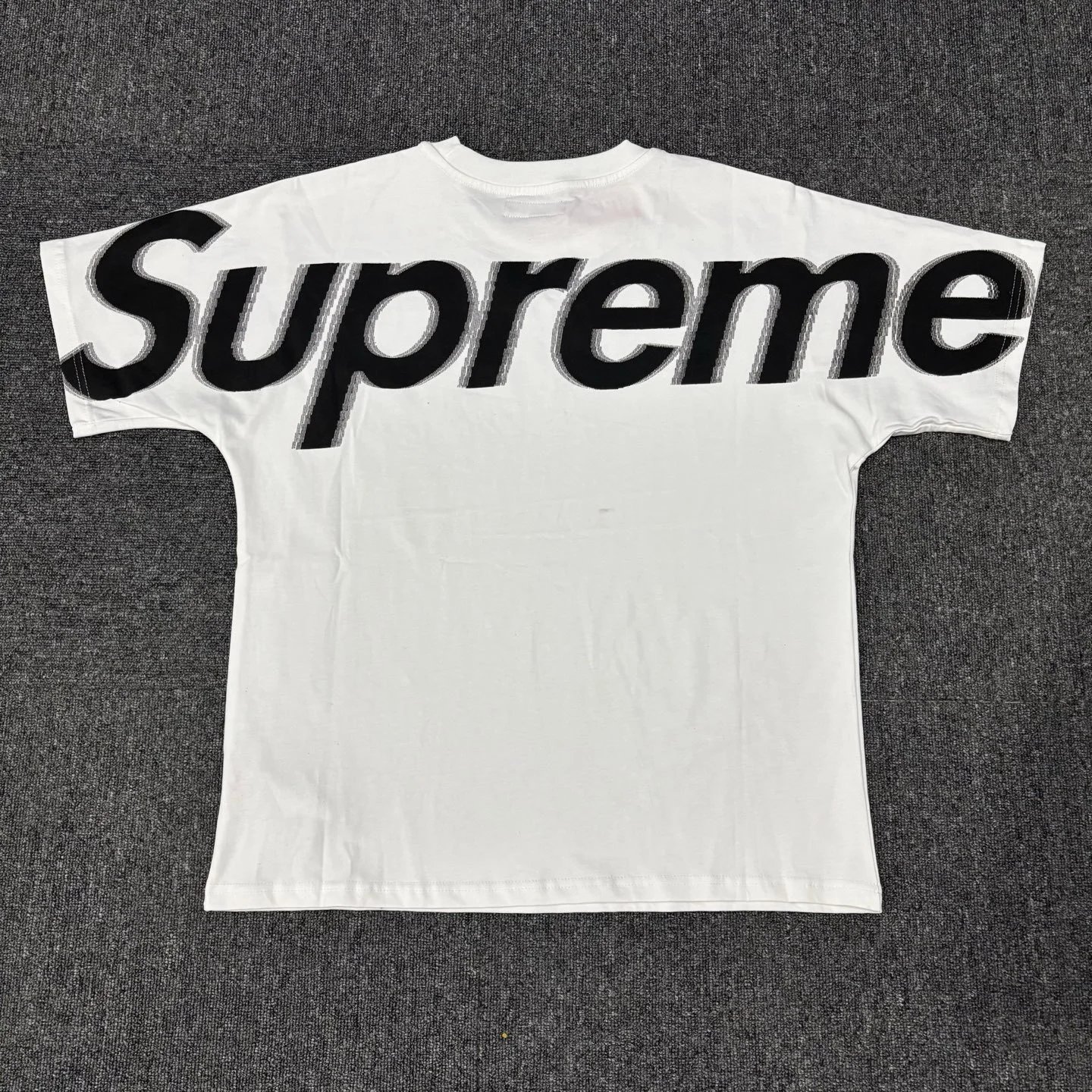 Supreme T-Shirts Logo Print Short-Sleeve T-Shirt — White background with black label
