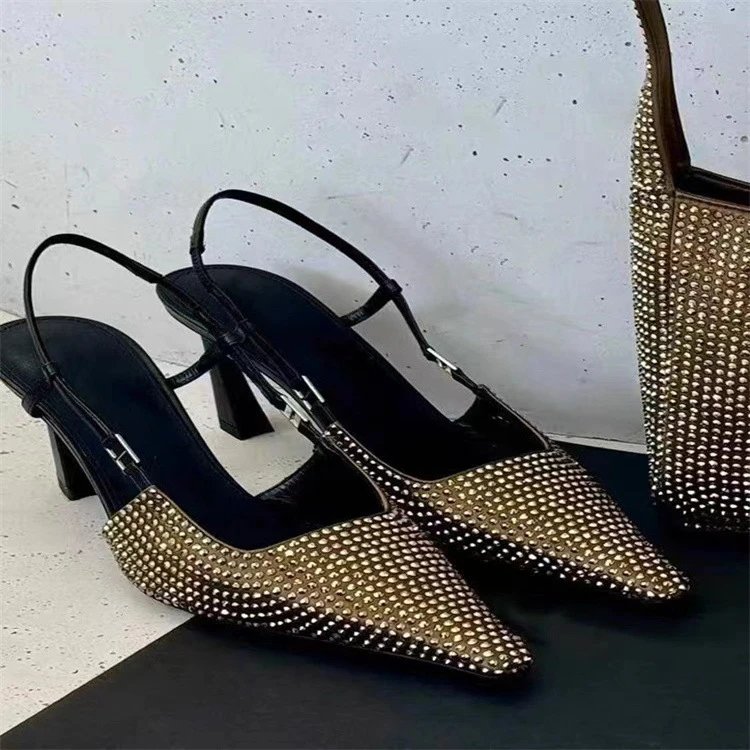 Valentino Garavani Rockstud Spike Pointed-Toe Slingback Heels in Gold and Black - 9