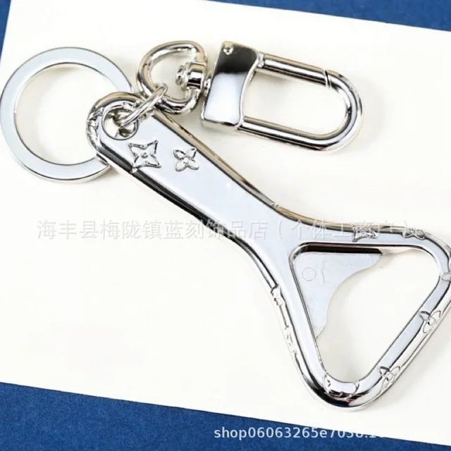 Louis Vuitton Uncategorized Metal car keychain with LV monogram and floral charms product detail image 4
