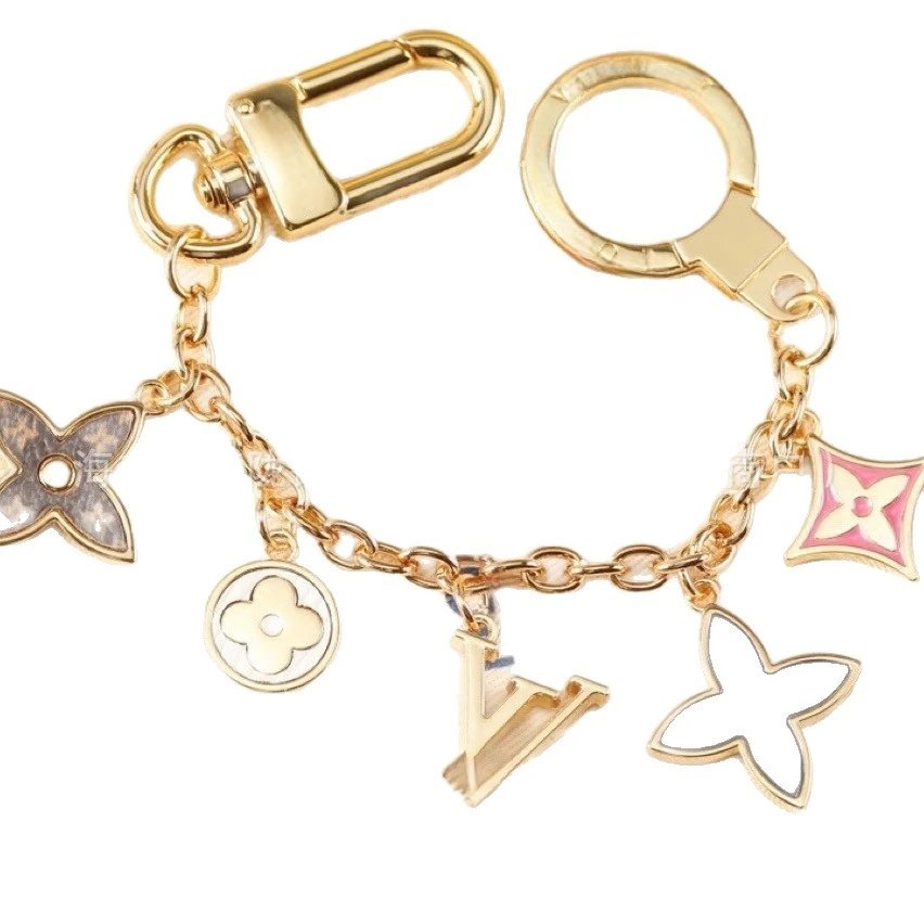 Louis Vuitton Uncategorized Metal car keychain with LV monogram and floral charms image 5
