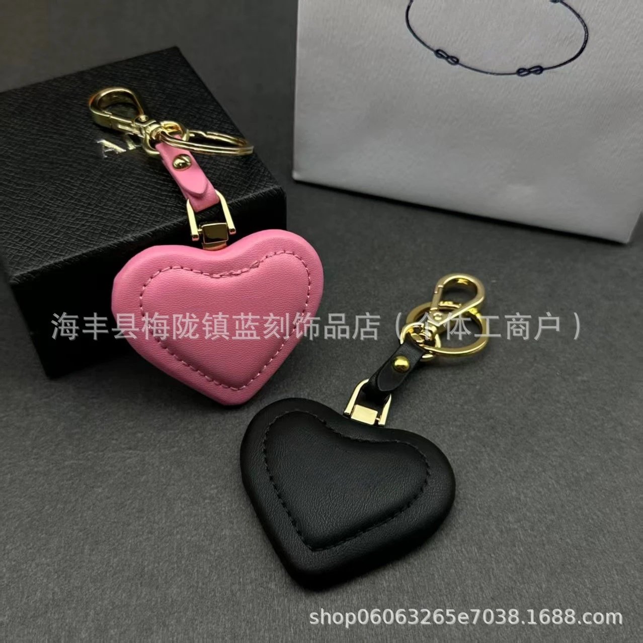 Heart-Shaped Leather Keychain in Black and Pink - 3