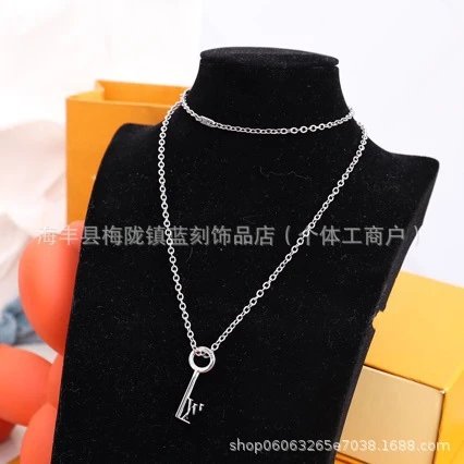 Louis Vuitton Trunk Pendant Necklace Gold and Silver - 4